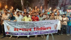 সাবের হোসেন চৌধুরীর মুক্তির প্রতিবাদে মশাল মিছিল