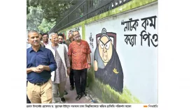 জুলাই বিপ্লবের গ্রাফিতি দেখলেন প্রধান উপদেষ্টা