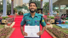 ডিফেন্ডার ইসা ফয়সাল পেলেন আইজি ব্যাজ