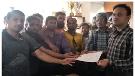 গজারিয়ায় এসিল্যান্ডের বিরুদ্ধে অপপ্রচারের প্রতিবাদে মানববন্ধন
