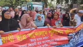 আইন উপদেষ্টার পদত্যাগ দাবিতে বিক্ষোভ