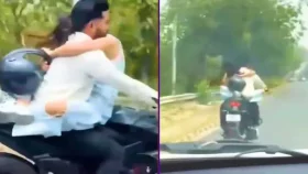 বান্ধবীকে কোলে নিয়ে বাইক চালানোর খেসারত, বিপুল অঙ্কের জরিমানা