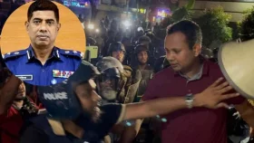 লাল পোশাক পরিহিত যুবক ডিবির কেউ নন