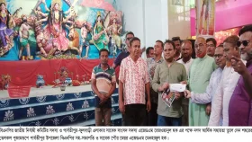 পার্বতীপুরে বিএনপির পূজা মন্ডপ পরিদর্শন ও আর্থিক সহায়তা