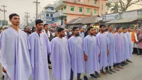 কাফনের কাপড় পড়ে দাঁড়িপাল্লার গণমিছিল