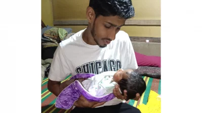 সন্তান রাজিমের সঙ্গে তার বাবা ইয়াম